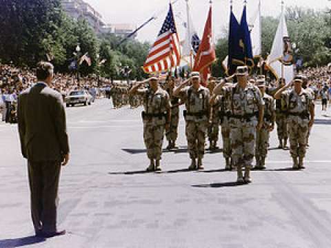 Schwarzkopf is met by then-President George Bush during a homecoming parade for troops returning from the Gulf War in 1991.