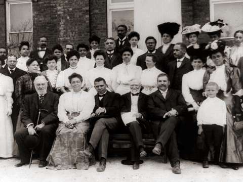 Carnegie with African-American leader Booker T. Washington (front row, center) in 1906 while visiting Tuskegee Institute.