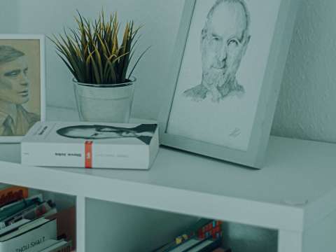 Steve Job's photo on a bookshelf