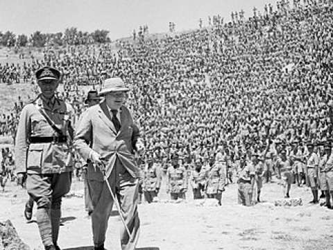 Churchill in the Roman amphitheatre of ancient Carthage to address 3,000 British and American troops, June 1943