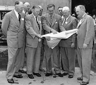 Disney shows the plans of Disneyland to officials from Orange County in December 1954
