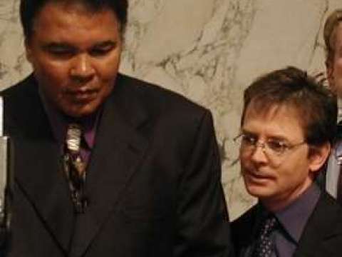  Ali and Michael J. Fox testify before a Senate committee on providing government funding to combat Parkinson's