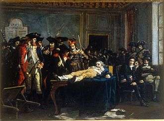 Lying on a table, wounded, in a room of the convention, Robespierre is the object of the curiosity and quips of Thermidorians, painting by Lucien-Étienne Mélingue (Salon de 1877)(Musée de la Révolution française)