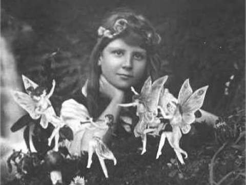 One of the five photographs of Frances Griffiths with the alleged fairies, taken by Elsie Wright in July 1917.