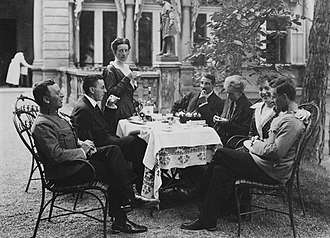 The Wittgenstein family in Vienna, Summer 1917, with Kurt (furthest left) and Wittgenstein (furthest right) in officers' uniforms.