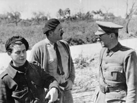 Hemingway (center) with Dutch filmmaker Joris Ivens and German writer Ludwig Renn (serving as an International Brigades officer) in Spain during Spanish Civil War, 1937