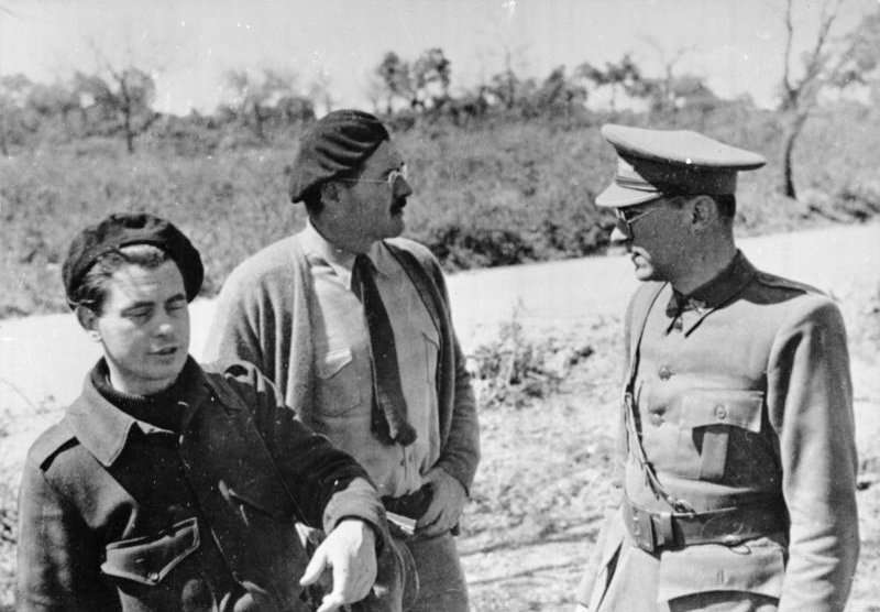 Hemingway (center) with Dutch filmmaker Joris Ivens and German writer Ludwig Renn (serving as an International Brigades officer) in Spain during Spanish Civil War, 1937