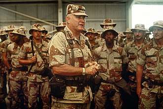 Schwarzkopf speaks with troops supporting Operation Desert Shield in 1991.