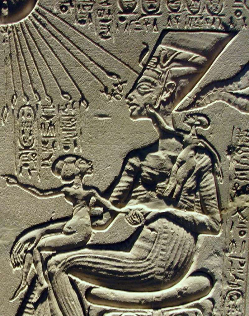 Amarna relief showing Nefertiti with her daughters Meketaten (on lap) and Ankhesenpaaten (on shoulder).