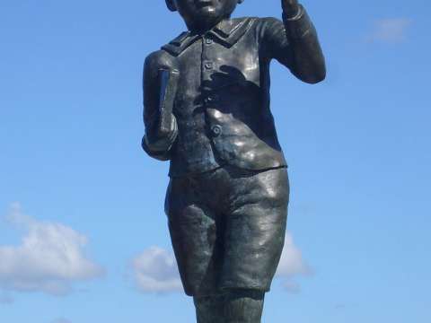 A statue of a young Ernest Rutherford at his memorial in Brightwater, New Zealand.
