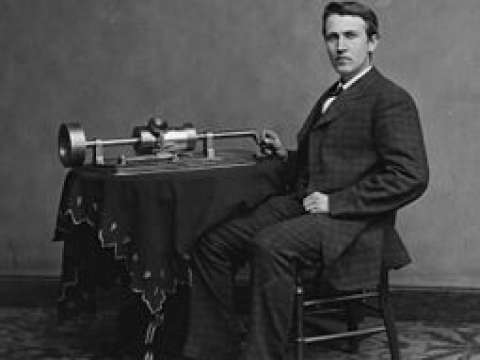 Photograph of Edison with his phonograph (2nd model), taken in Mathew Brady's Washington, D.C. studio in April 1878