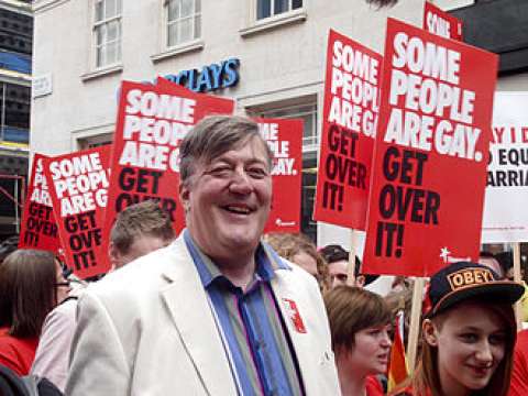 Stephen Fry with Stonewall marchers at WorldPride 2012 in London