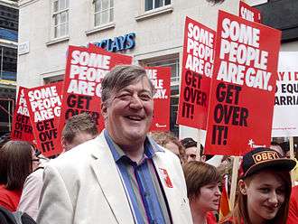 Stephen Fry with Stonewall marchers at WorldPride 2012 in London