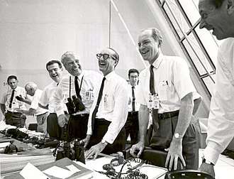 Charles W. Mathews, von Braun, George Mueller, and Lt. Gen. Samuel C. Phillips in the Launch Control Center following the successful Apollo 11 liftoff on 16 July 1969