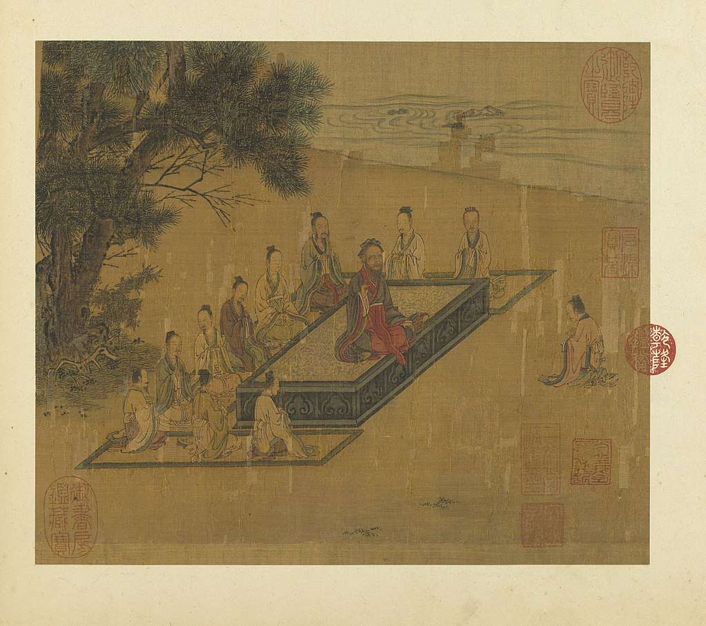 Zengzi (right) kneeling before Confucius (center), as depicted in a painting from the Illustrations of the Classic of Filial Piety, Song dynasty