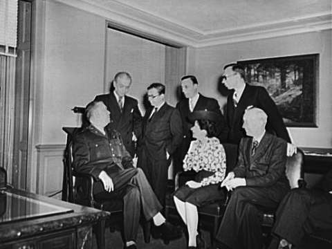 Sartre (third from left) and other French journalists visit General George C. Marshall in the Pentagon, 1945