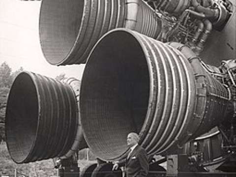 Von Braun with the F-1 engines of the Saturn V first stage at the U.S. Space and Rocket Center