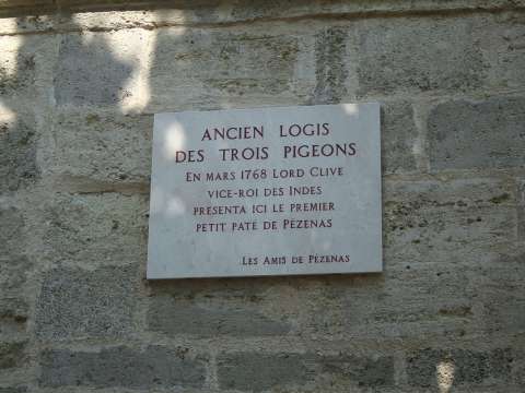 A plaque in memory of Lord Clive in Pézenas (France), where he stayed in 1768, and introduced a local delicacy, le petit pâté de Pézenas.