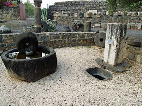 An olive mill and an olive press dating from Roman times in Capernaum, Israel.