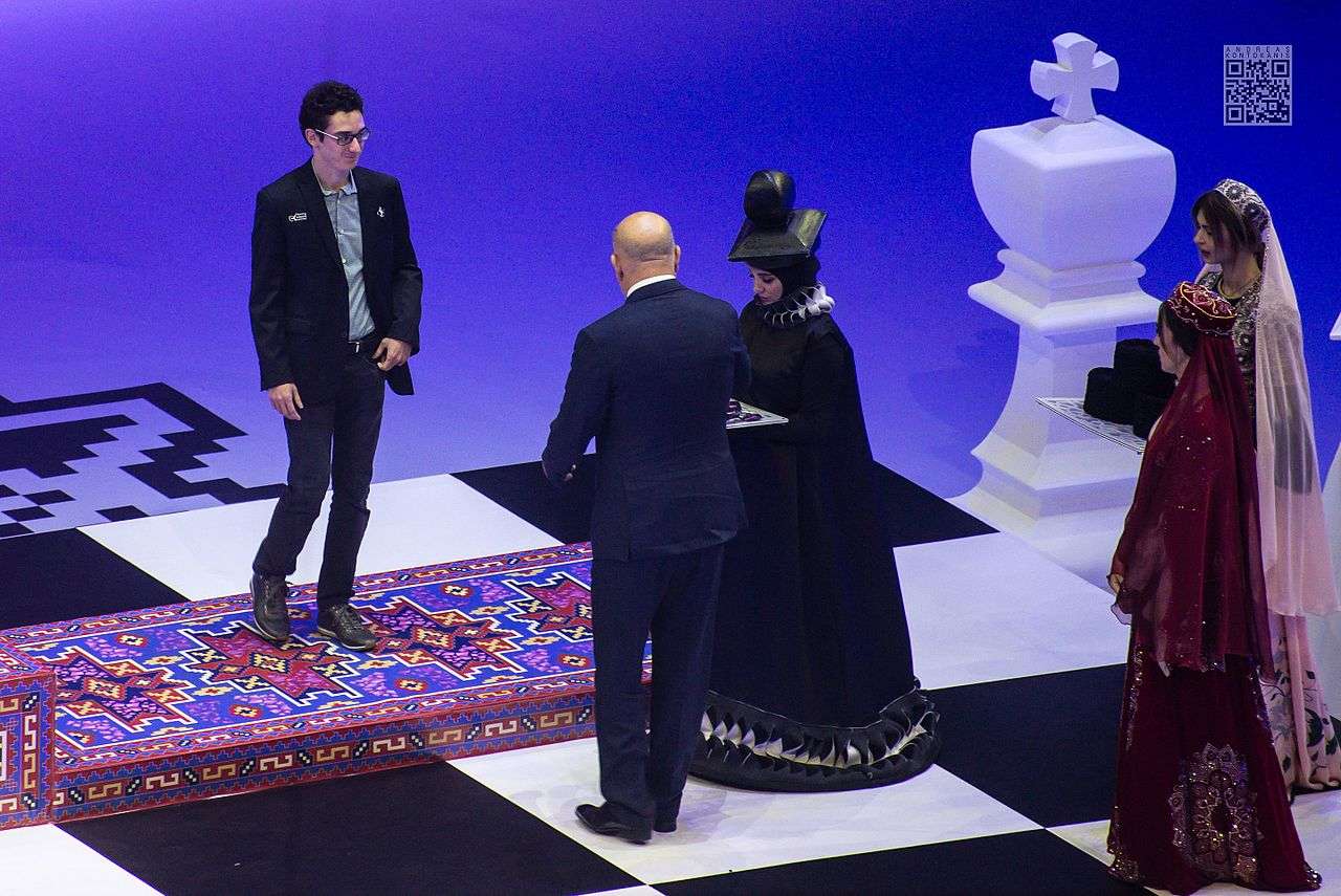 Caruana receives the bronze medal for Board 1 at the Chess Olympiad.