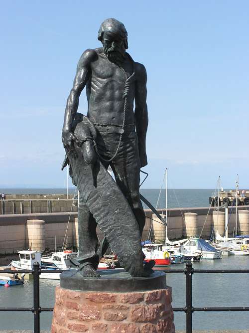 A statue of the Ancient Mariner at Watchet Harbour, Somerset, England