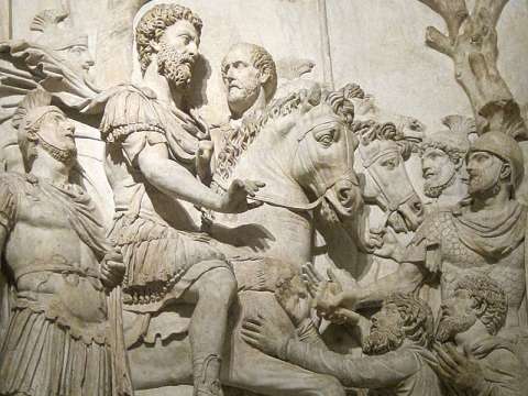 Marcus Aurelius receiving the submission of the vanquished, with raised vexillum standards