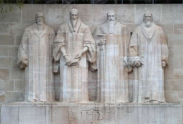The Reformation Wall in Geneva. From left: William Farel, John Calvin, Beza, and John Knox