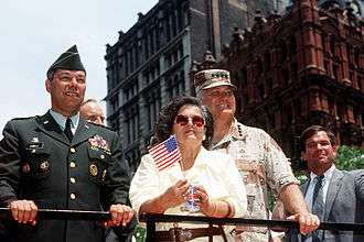 Gen. Colin Powell, Gen. Norman Schwarzkopf, and Mrs. Schwarzkopf ride in the Welcome Home parade in New York City honoring the men and women who served in Desert Storm.