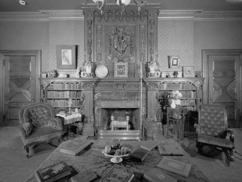 Library of Twain House, with hand-stenciled paneling, fireplaces from India, embossed wallpaper, and hand-carved mantel from Scotland