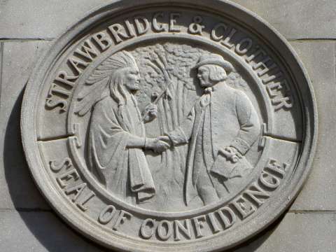 Penn on the seal of the defunct Strawbridge & Clothier department store, representing Penn's exchange with the Lenape; the Quaker Oats standing 