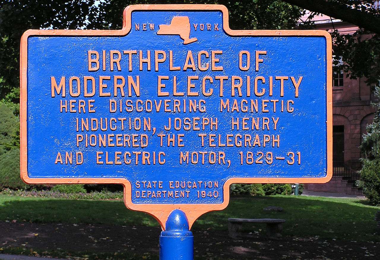 Historical marker in Academy Park (Albany, New York) commemorating Henry's work with electricity.