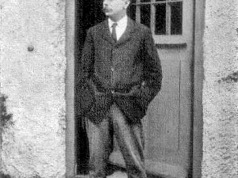 H. G. Wells in 1907 at the door of his home Spade House at Sandgate in Kent