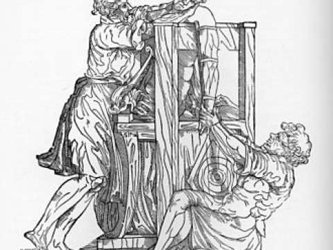 A woodcut of the reduction of a dislocated shoulder with a Hippocratic device