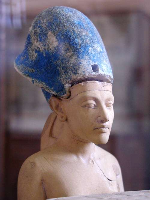 Small statue of Akhenaten wearing the Egyptian Blue Crown of War.