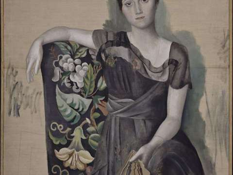 Portrait d'Olga dans un fauteuil.