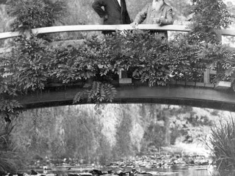 Monet, right, in his garden at Giverny, 1922