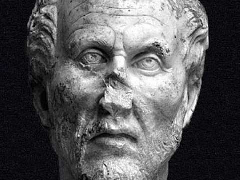 Head in white marble. The identification as Plotinus is plausible but not proven.