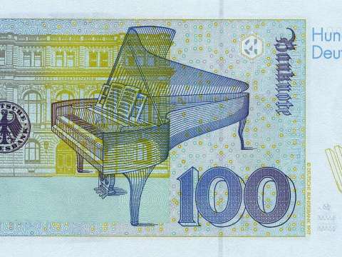 Banknote, reverse, showing a grand piano that she played, and the building of Dr. Hoch's where she taught