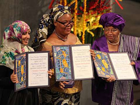 From left to right: Tawakkul Karman, Leymah Gbowee, and Ellen Johnson Sirleaf display their awards during the presentation of the Nobel Peace Prize, 10 December 2011.