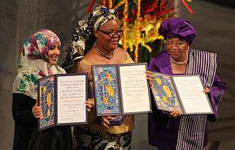 From left to right: Tawakkul Karman, Leymah Gbowee, and Ellen Johnson Sirleaf display their awards during the presentation of the Nobel Peace Prize, 10 December 2011.