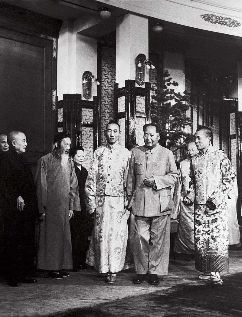 An iconic photo showing Panchen Lama (left), Mao and Dalai Lama (right) at Qinzheng Hall on 11 September 1954, four days before they attended the 1st National People's Congress.