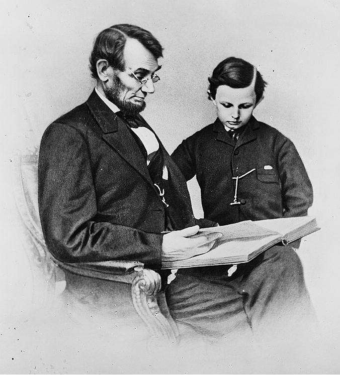  1864 photo of President Lincoln with youngest son, Tad.