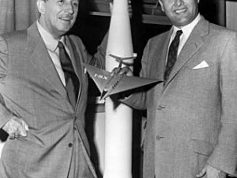 Walt Disney and von Braun, seen in 1954 holding a model of his passenger ship, collaborated on a series of three educational films.