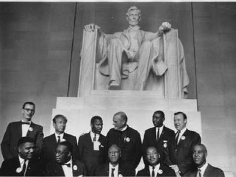 Leaders of the March on Washington posing in front of the Lincoln Memorial