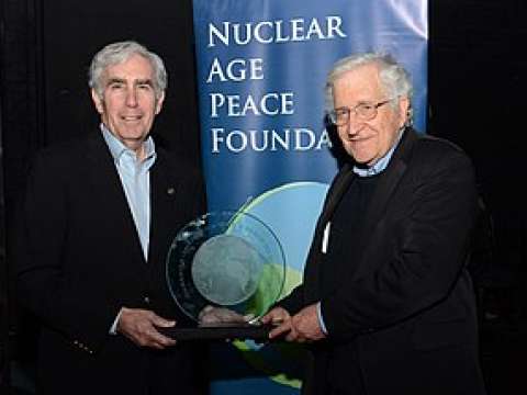 Chomsky receiving an award from the president of the Nuclear Age Peace Foundation, David Krieger (2014)