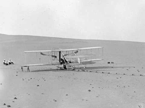 The modified 1905 Flyer at the Kill Devil Hills in 1908, ready for practice flights. Note there is no catapult derrick; all takeoffs were used with the monorail alone.