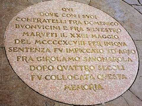 A plaque commemorates the site of Savonarola's execution in the Piazza della Signoria, Florence.