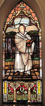 A stained glass portrayal of Luther