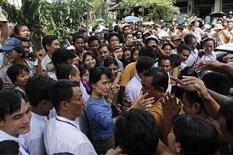 Aung San Suu Kyi greeting supporters from Bago State in 2011