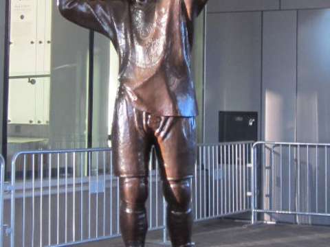 A statue, located outside Rogers Place in Edmonton, of Gretzky hoisting the Stanley Cup, which the Oilers won four times with him. Sculpted by John Weaver.
